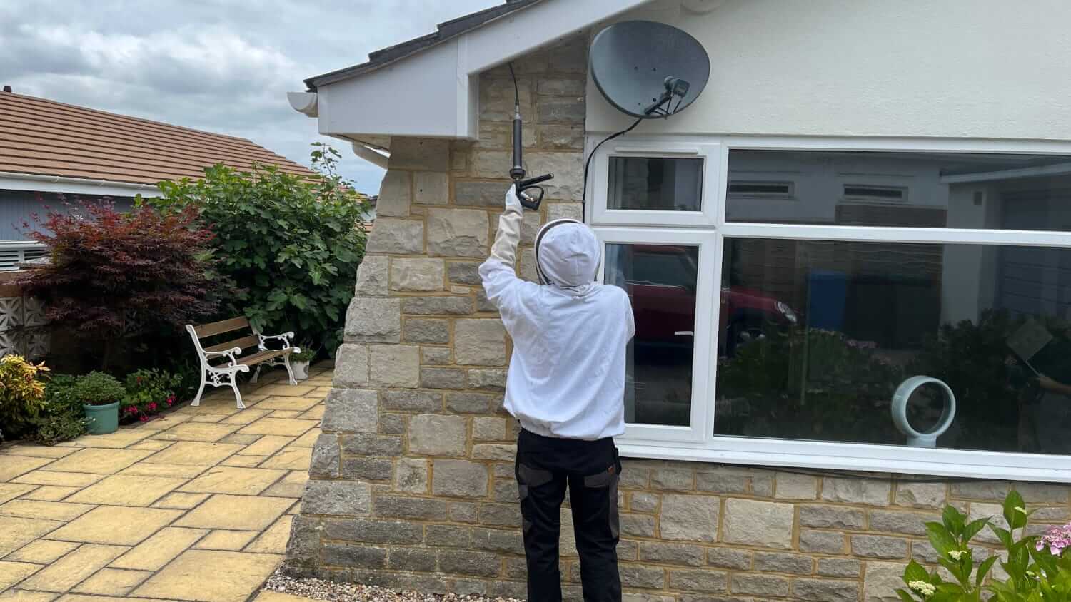 Treating a wasp nest in a garage